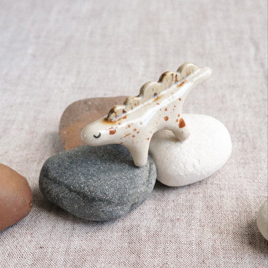 Taschentier | Dino mit braunen Splashes